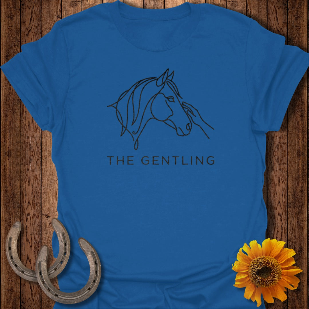 Blue t-shirt with a black line drawing of a horse's head and text "THE GENTLING".