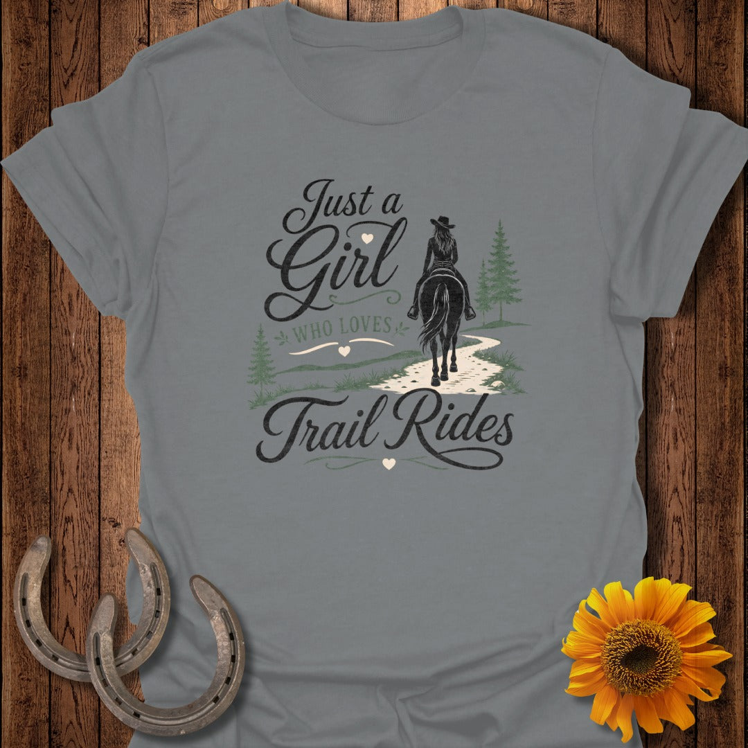 Grey t-shirt with "Just a girl who loves trail rides" and horse rider graphic.