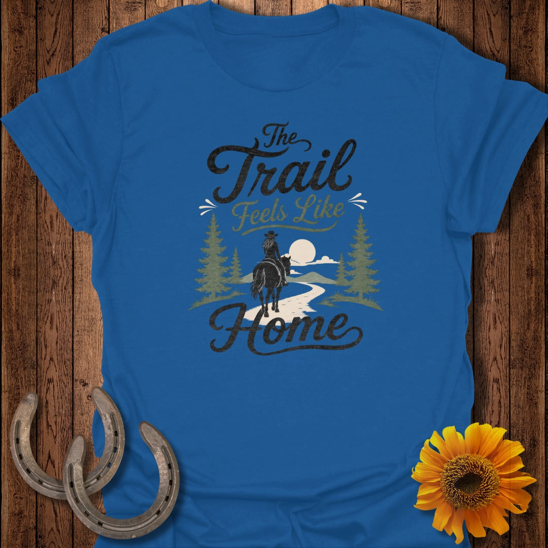 Blue t-shirt with "The Trail Feels Like Home" text and horse rider graphic.