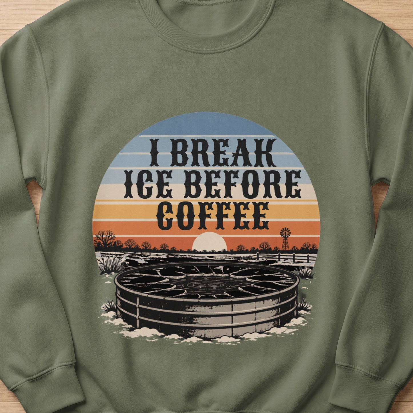 Crewneck sweatshirt with a graphic that reads "I break ice before coffee."