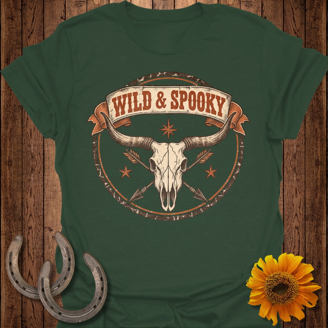 Dark green t-shirt with "Wild & Spooky" graphic featuring bull skull and arrows.