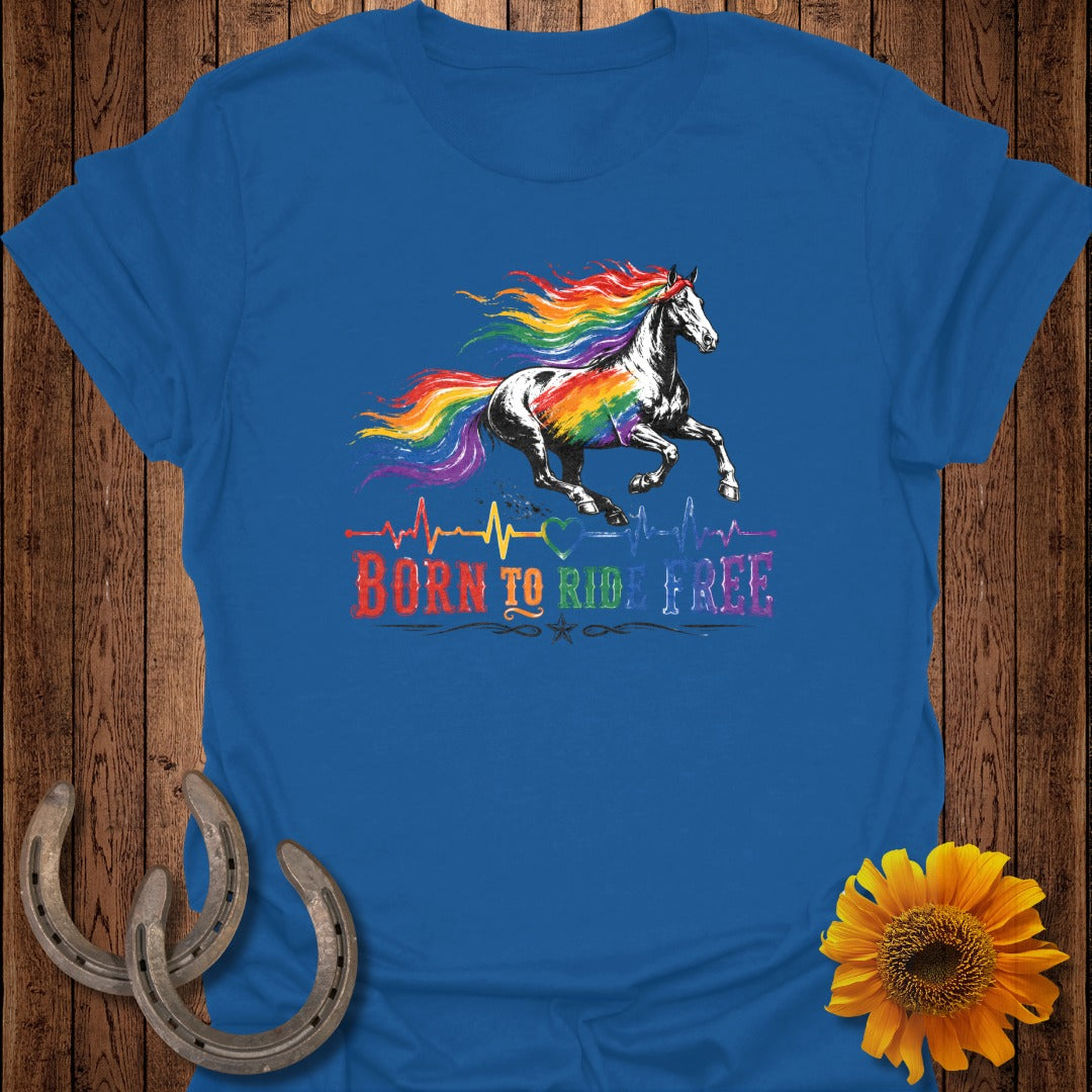 Blue t-shirt with galloping rainbow horse and "Born to Ride Free" text.
