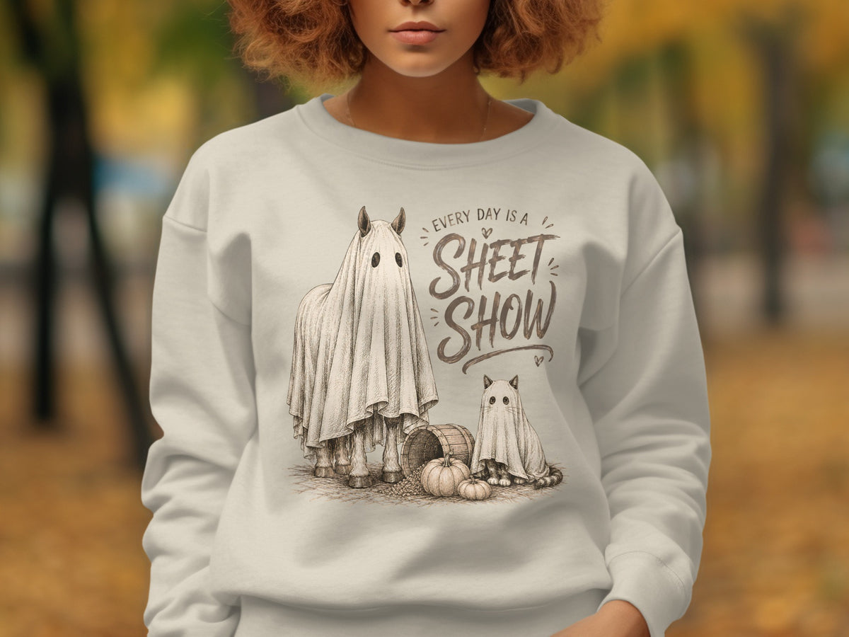 Sweatshirt with "Every Day is a Sheet Show" text and ghost-costumed horse and cat.