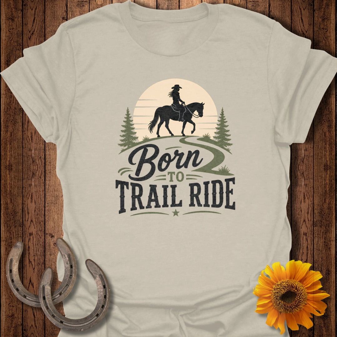 Born to Trail Ride text with silhouette of person riding horse.