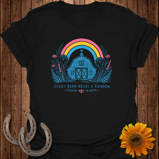 Black t-shirt with a blue barn graphic and rainbow over it, reads "Every Barn Needs a Rainbow."