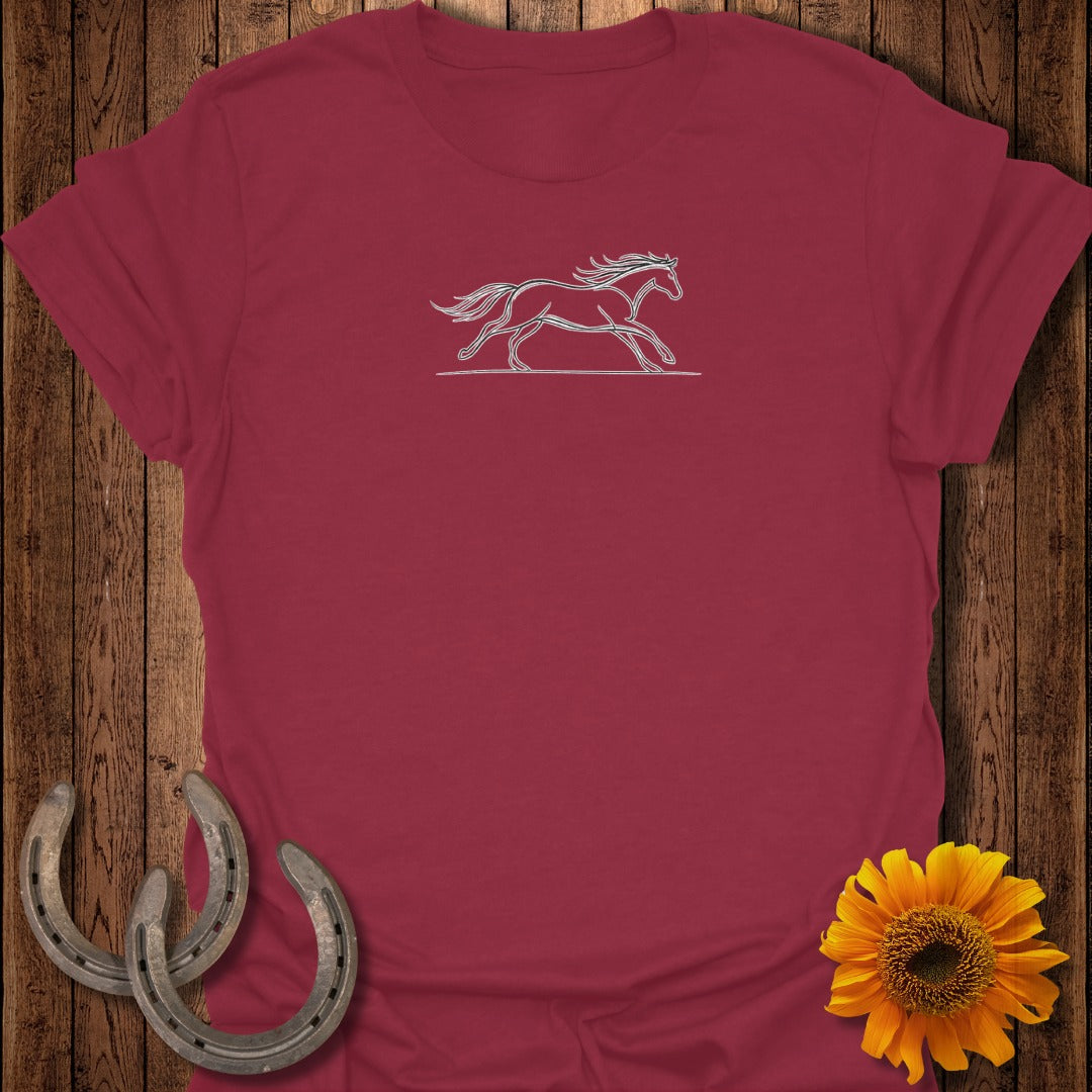 Red t-shirt with a white line drawing of a running horse on the chest.