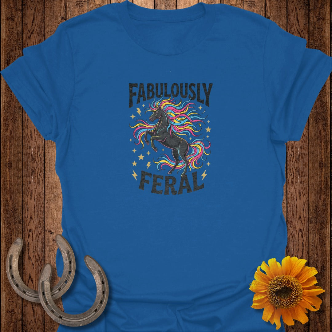 Blue t-shirt with a black unicorn and stars, text reads "Fabulously Feral".