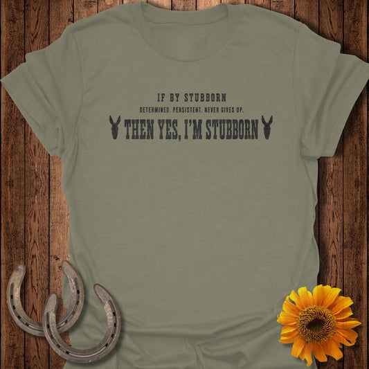 Olive green t-shirt with text about being stubborn, featuring donkey graphics.