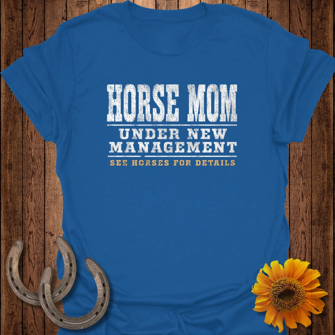 Blue t-shirt with "HORSE MOM UNDER NEW MANAGEMENT SEE HORSES FOR DETAILS" text.