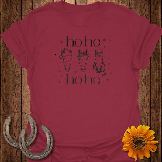 Maroon t-shirt with horses in Santa hat, scarf, and "ho ho ho" text.