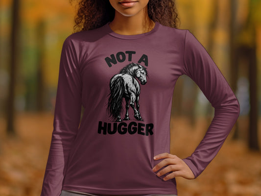 Maroon long-sleeve shirt with "Not A Hugger" text and horse graphic.