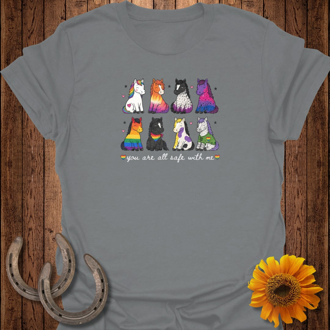 Colorful cartoon unicorns in rainbow patterns with hearts and stars, text "you are all safe with me".