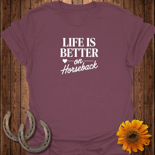 Maroon t-shirt with "Life is Better on Horseback" text, horseshoe, and sunflower.