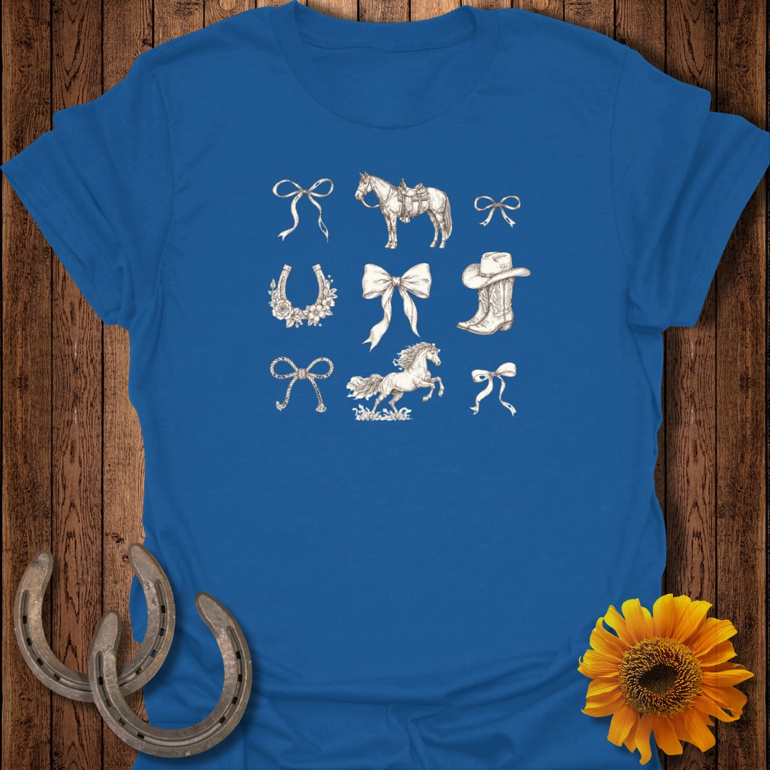 Blue t-shirt with assorted equestrian and bow illustrations.