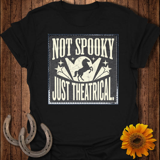 Black t-shirt with "NOT SPOOKY JUST THEATRICAL" text and horse graphic.