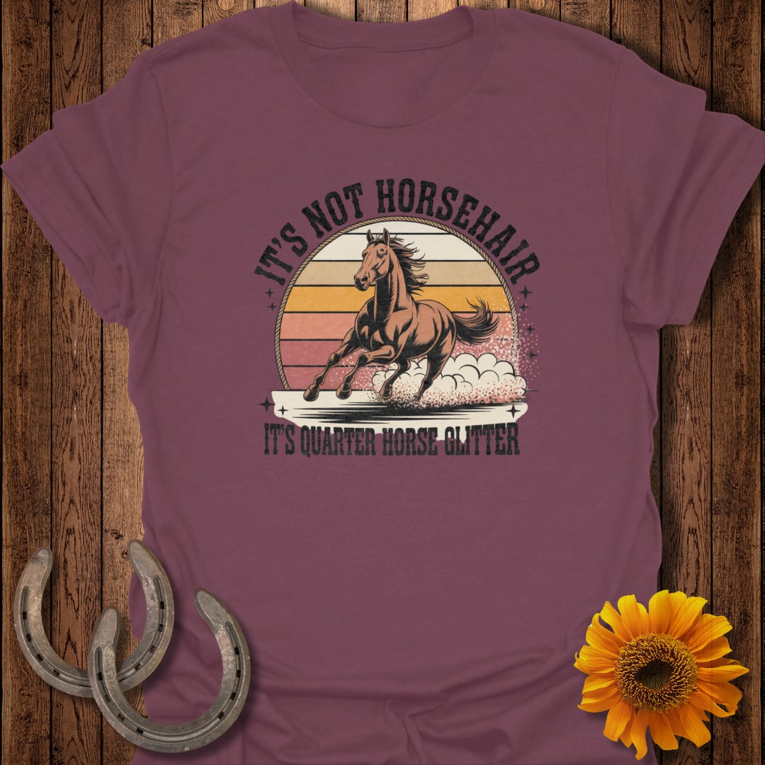 T-shirt with "It's not horsehair, it's quarter horse glitter" text and a running horse.