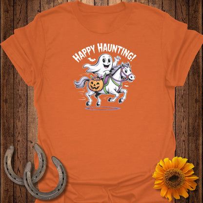 Ghost riding a horse with pumpkin basket, text "Happy Haunting!"