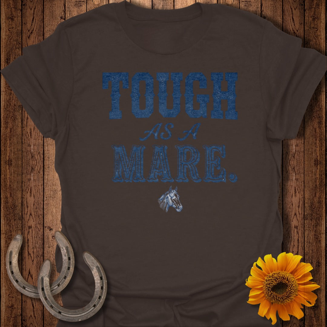 Brown t-shirt with "TOUGH AS A MARE" text and horse graphic, with horseshoes and sunflower.
