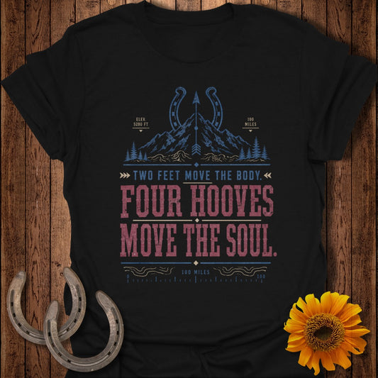 Black t-shirt with mountain, horseshoe, and text "Four Hooves Move The Soul".