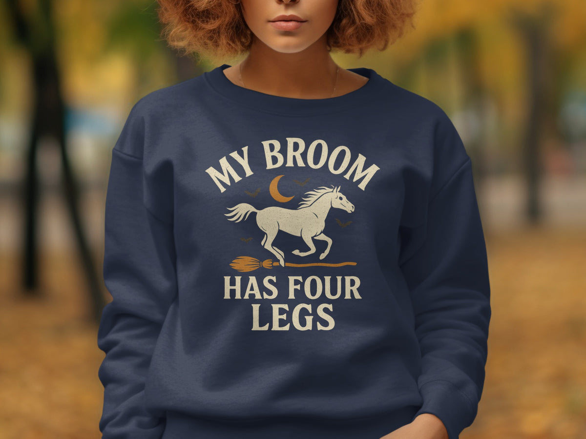 Navy sweatshirt with "MY BROOM HAS FOUR LEGS" text and horse design.