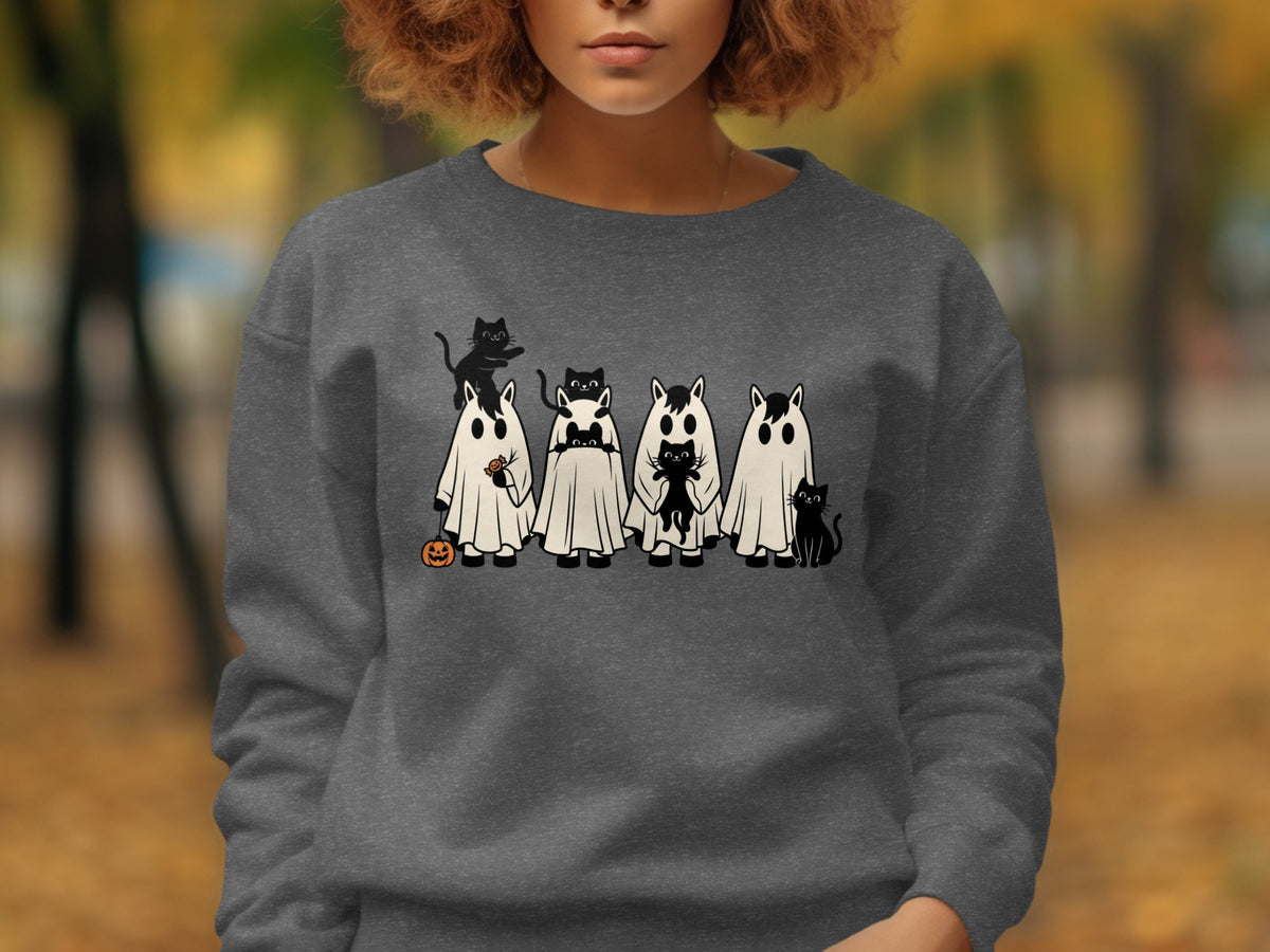 Ghost and cat Halloween graphic with a pumpkin on a grey sweatshirt.
