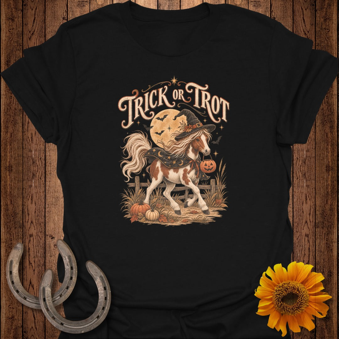 Horse wearing witch hat and carrying pumpkin, text "Trick or Trot."