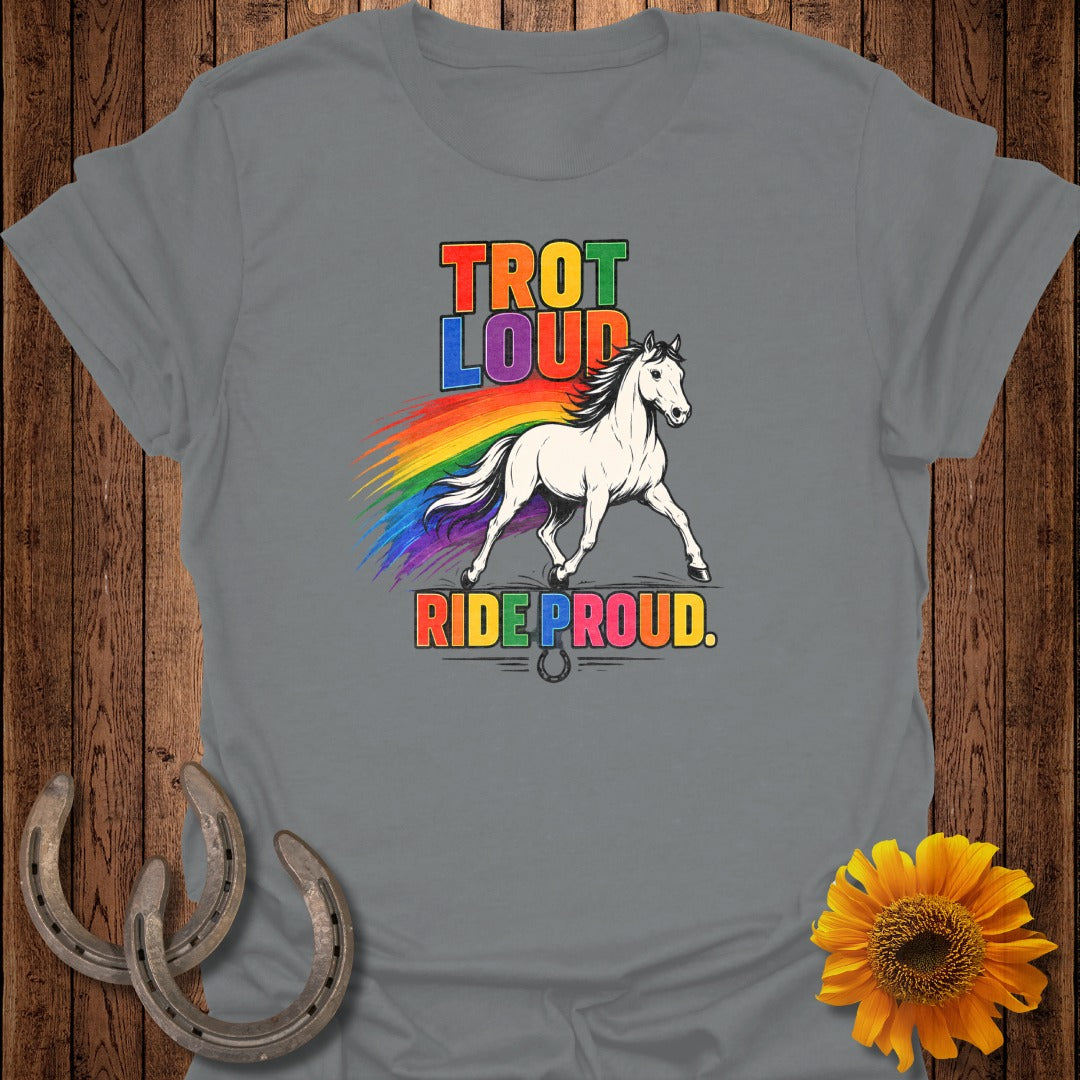 White horse with rainbow mane and tail, text "Trot Loud Ride Proud".