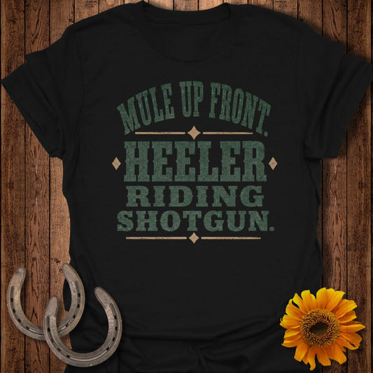 Black t-shirt with green text: "Mule up front, heeler riding shotgun."