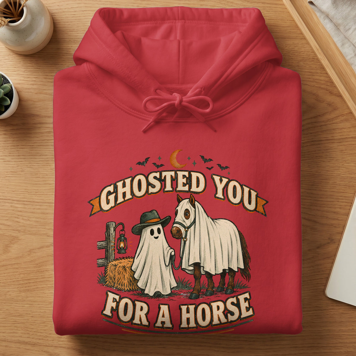 Red hoodie with a "Ghosted You For A Horse" Halloween graphic.
