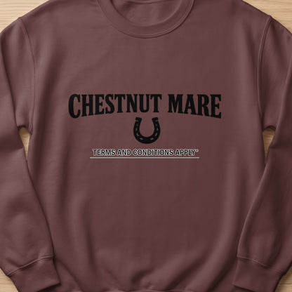 Brown sweatshirt with "CHESTNUT MARE" text, a horseshoe, and "TERMS AND CONDITIONS APPLY" text.