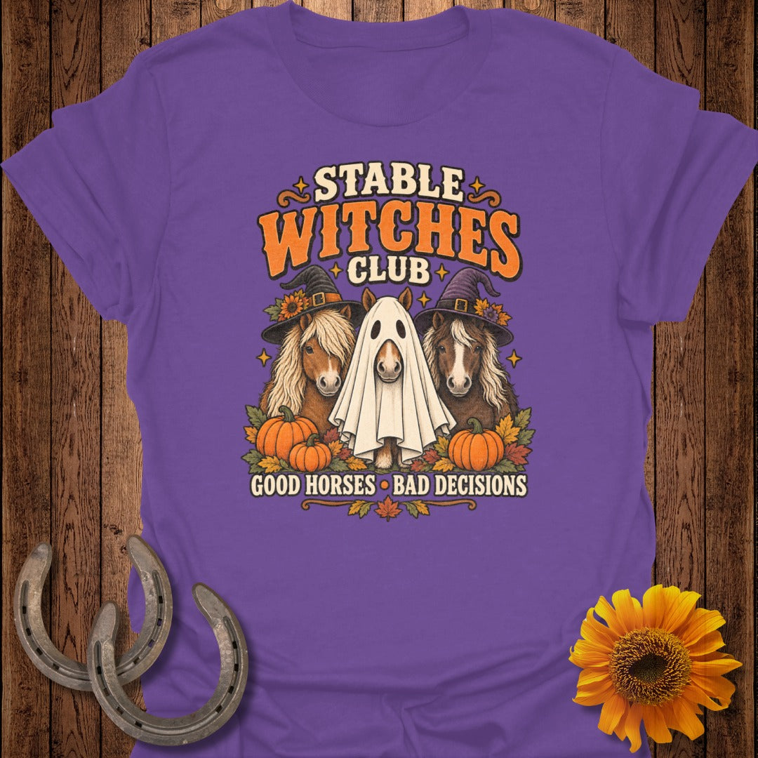 T-shirt with "Stable Witches Club" and three horses: one in a ghost costume, two in witch hats.