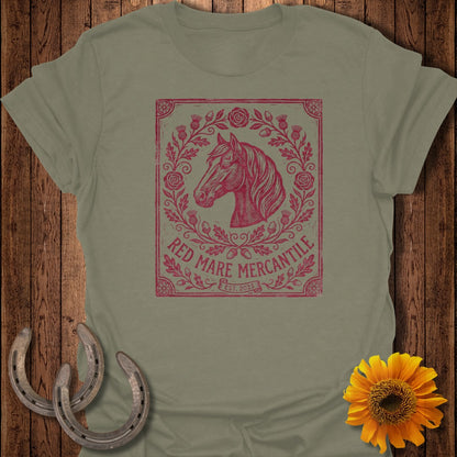 Olive green t-shirt with a distressed red graphic of a horse head in a floral wreath.