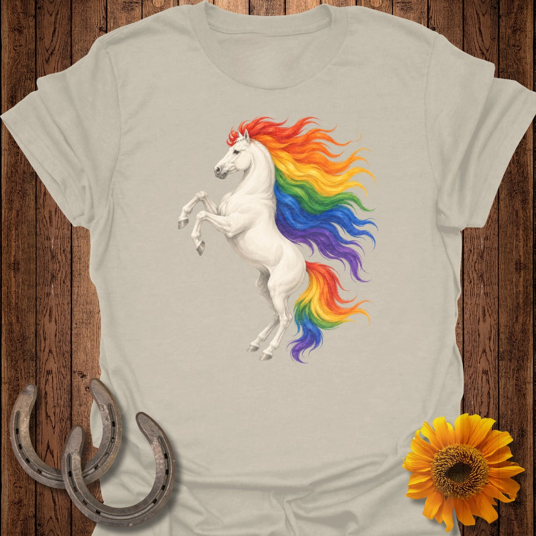 White unicorn with rainbow mane and tail rearing up, beside a sunflower.