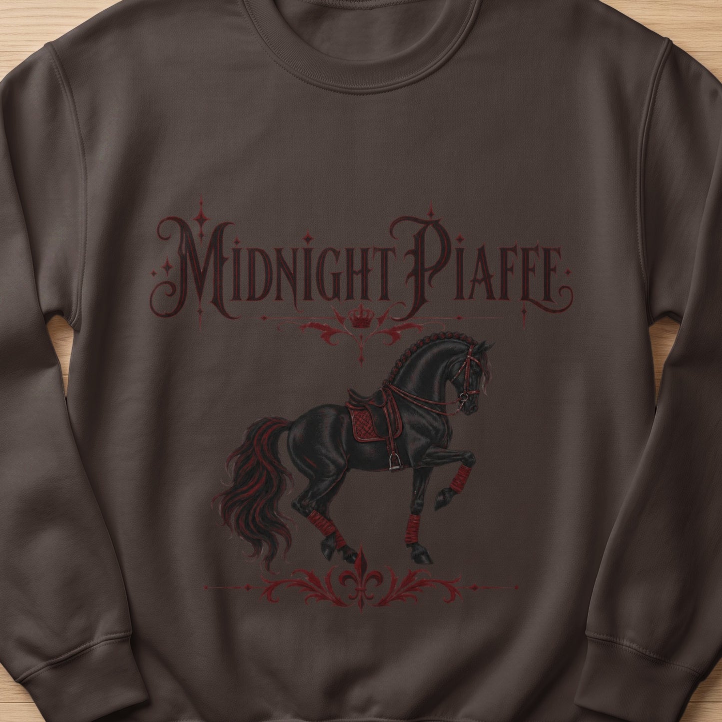 Brown sweatshirt with a black horse and "Midnight Piaffe" text design.