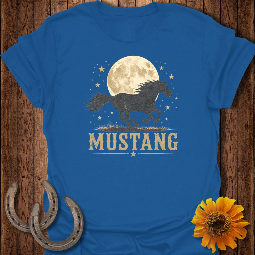 Blue t-shirt with a running black mustang silhouette under a full moon and stars, the word MUSANG below.