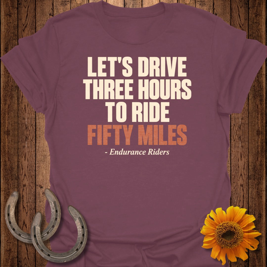 Purple t-shirt with text "LET'S DRIVE THREE HOURS TO RIDE FIFTY MILES - Endurance Riders".