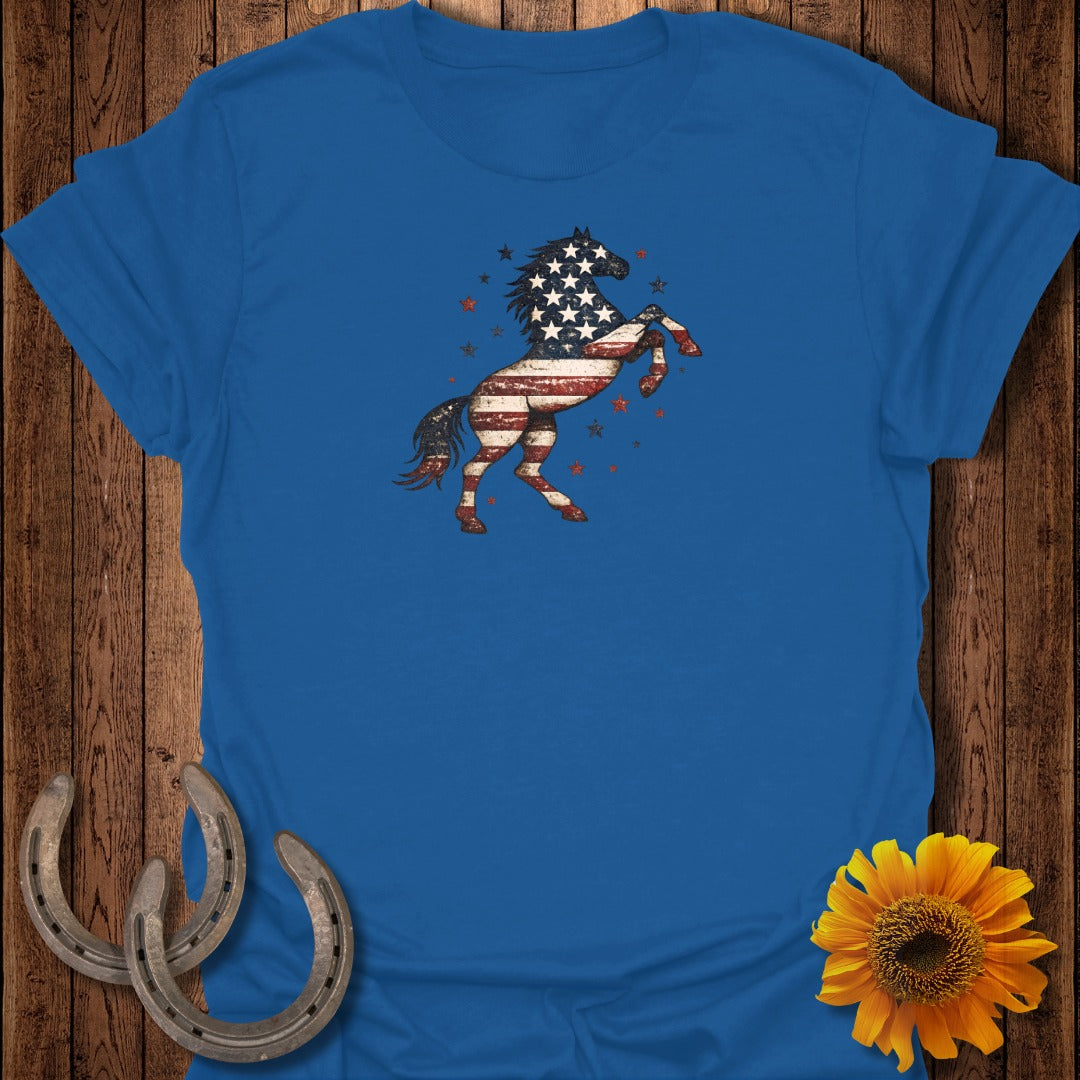Blue t-shirt with patriotic American flag horse graphic and stars.