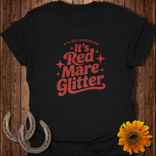 Black t-shirt with red text reading "It's not horsehair, it's Red Mare Glitter."