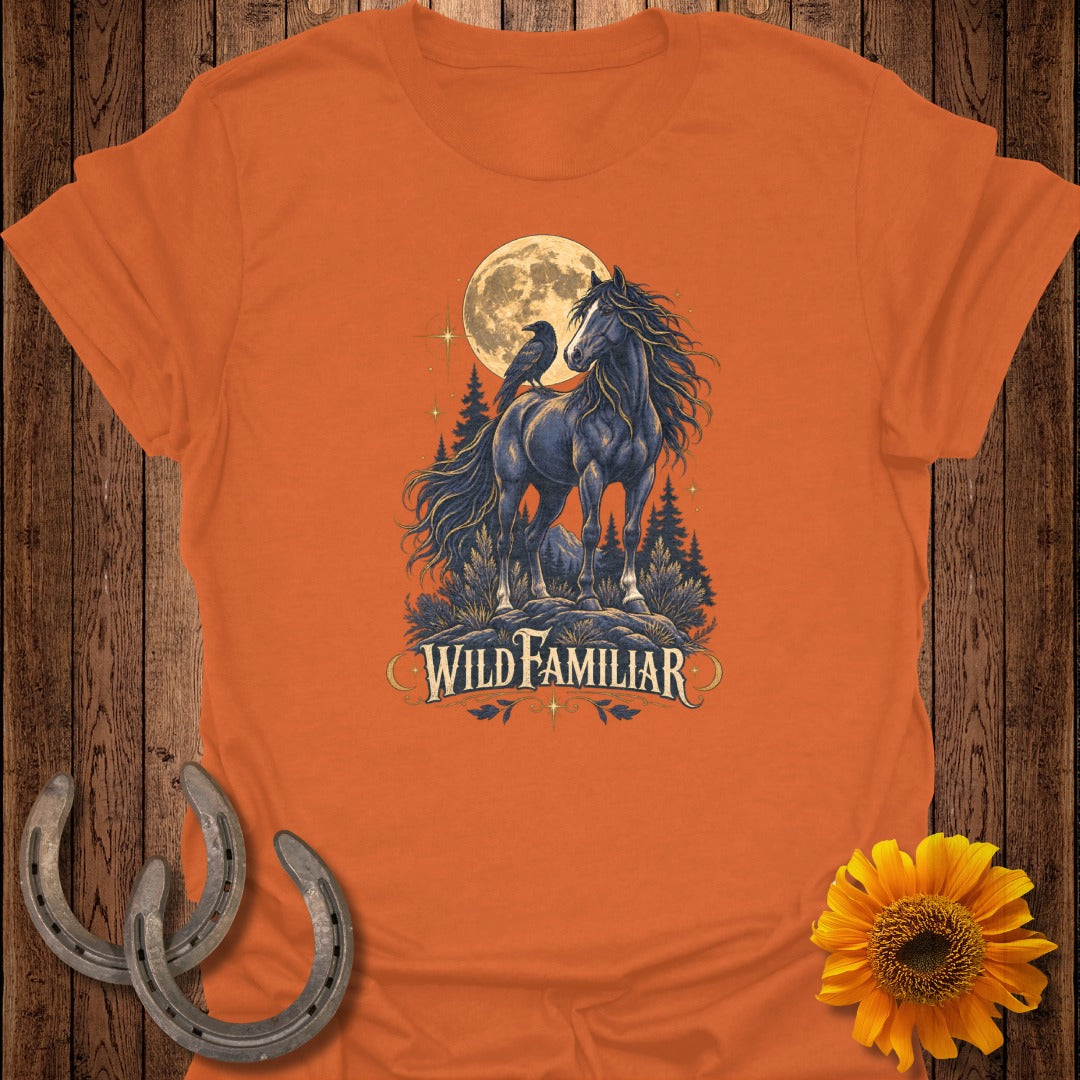 Dark horse with raven on back under full moon, text "Wild Familiar".