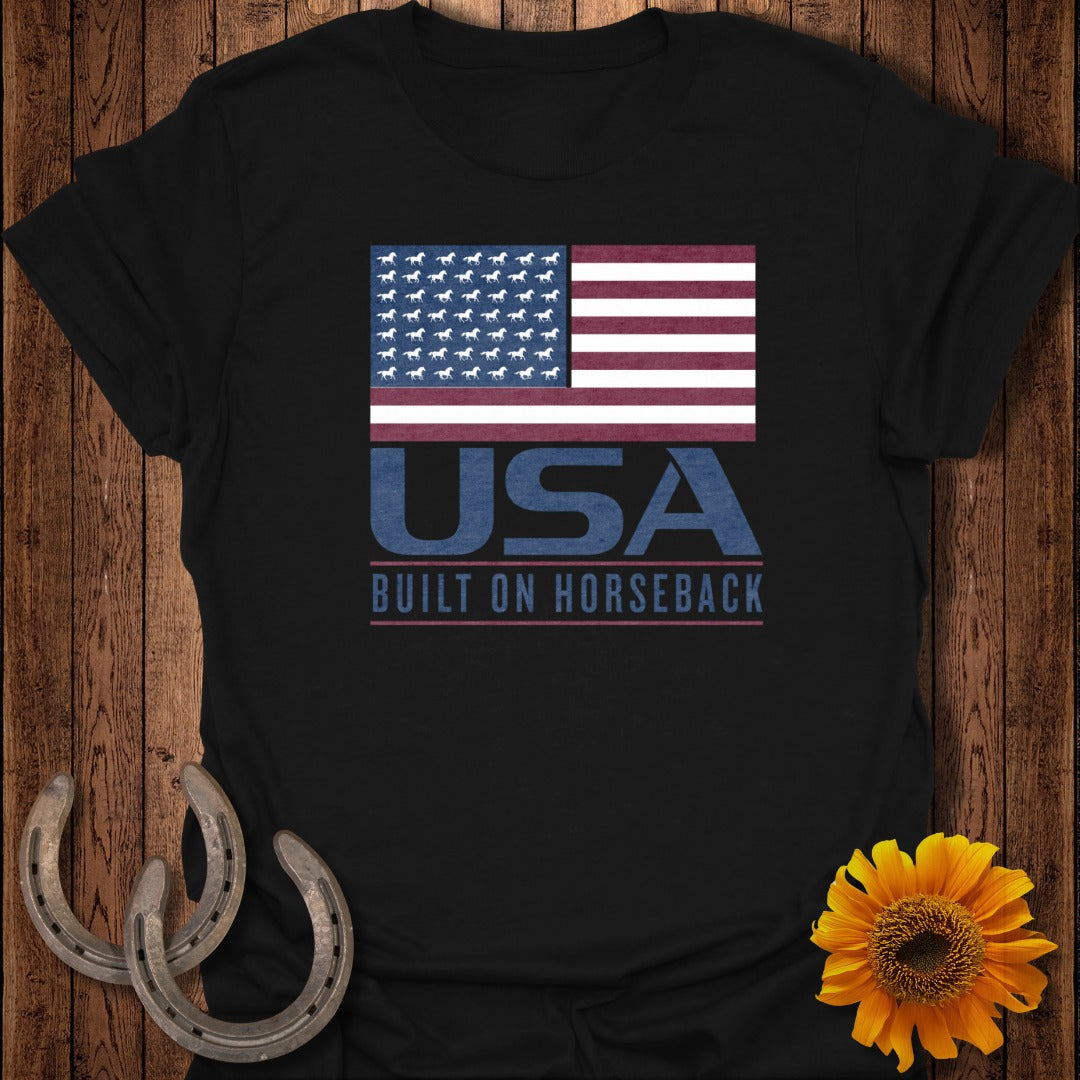 Black t-shirt with American flag graphic made of horses, text USA BUILT ON HORSEBACK.