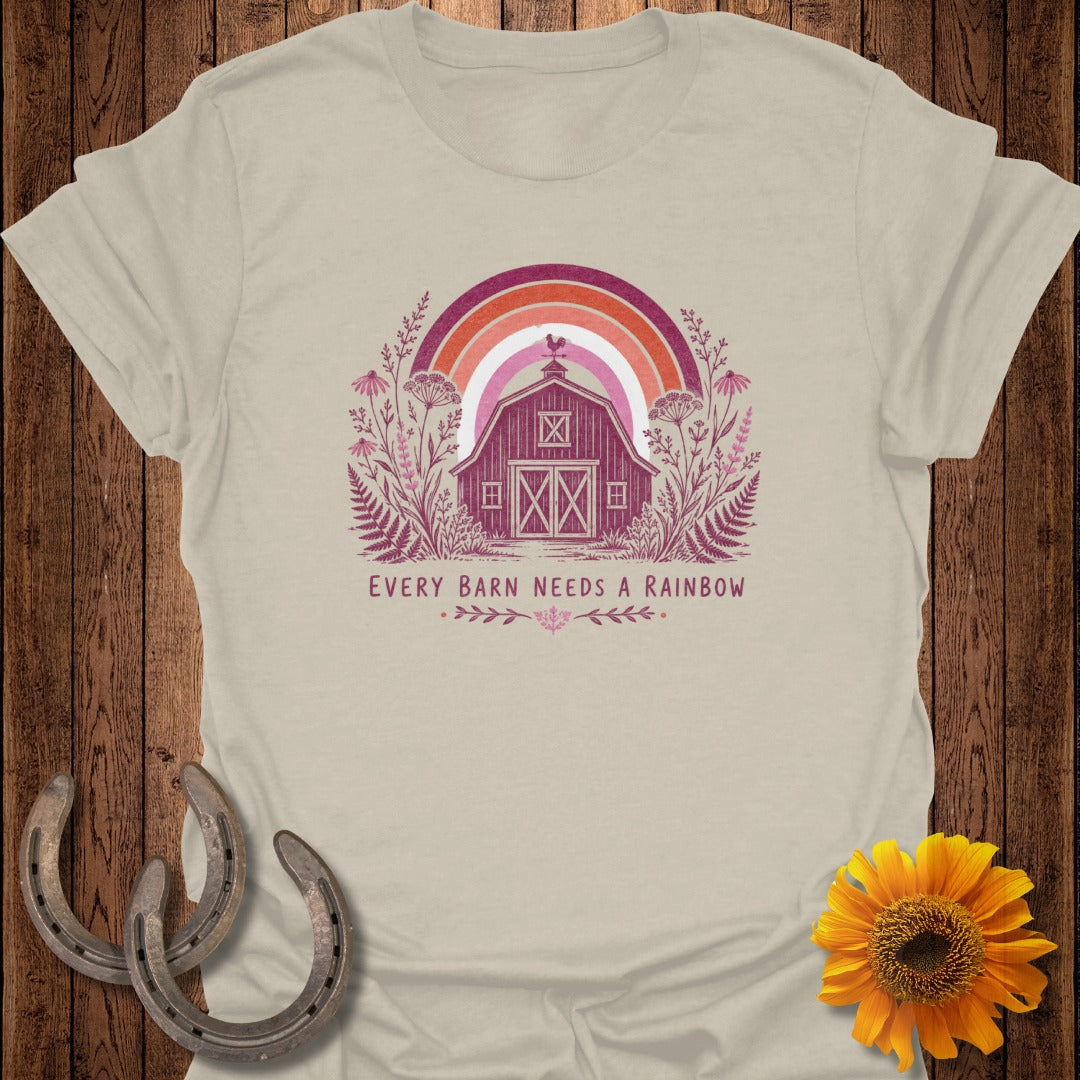 Pink barn with rainbow, flowers, and text "Every Barn Needs A Rainbow".