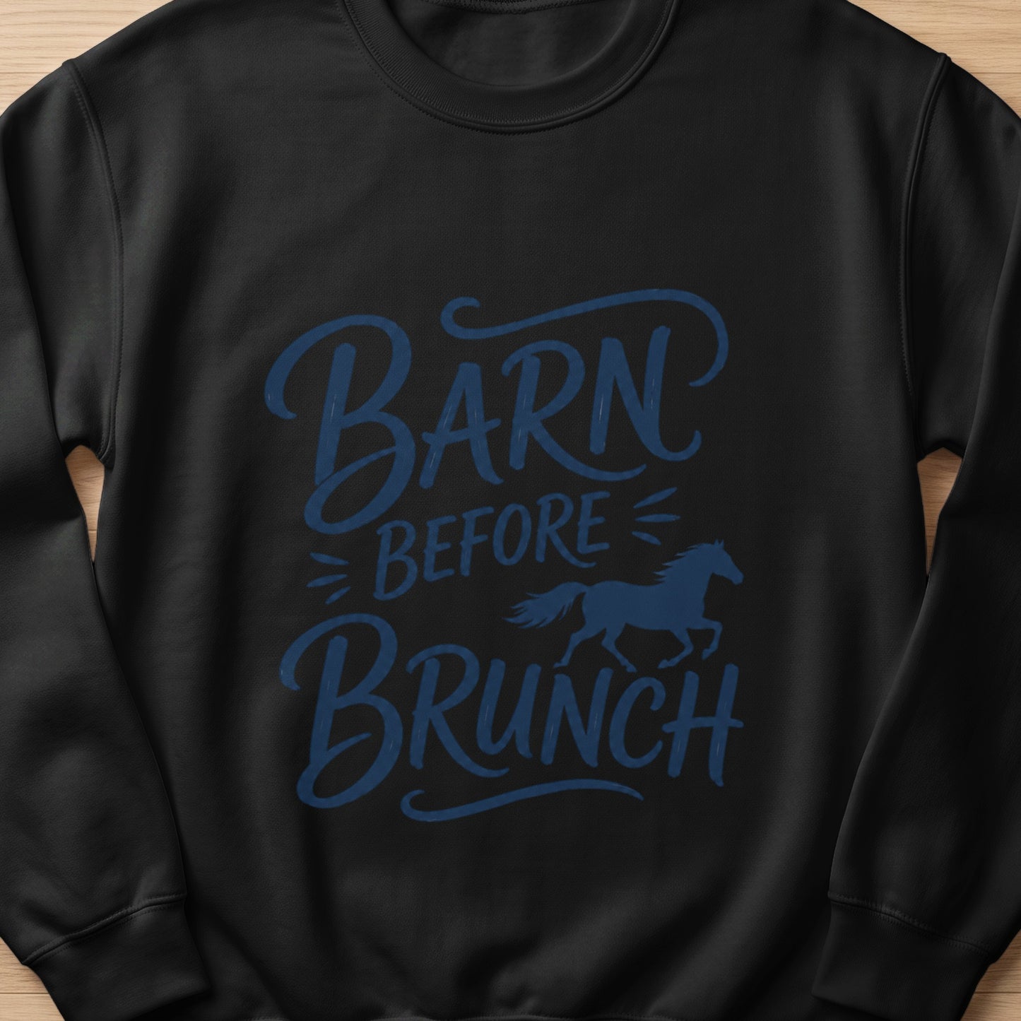 Black sweatshirt with "Barn Before Brunch" text and a blue horse silhouette.