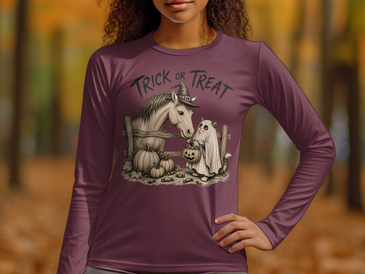 Horse in witch hat and ghost cat with candy stand behind fence.
