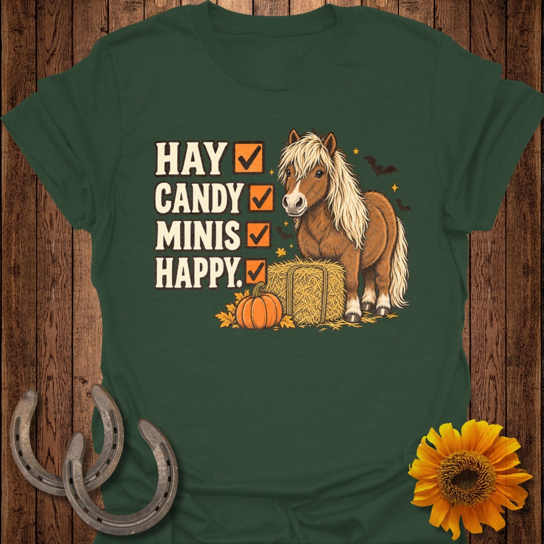 Green t-shirt with checklist: HAY, CANDY, MINIS, HAPPY. Features pony, hay bale, pumpkin.