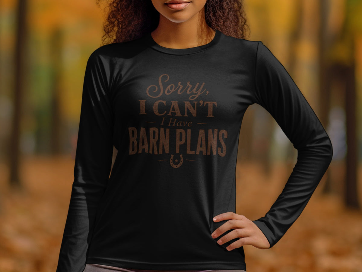 Black long-sleeve shirt with text "Sorry, I CAN'T I Have BARN PLANS" and horseshoe graphic.