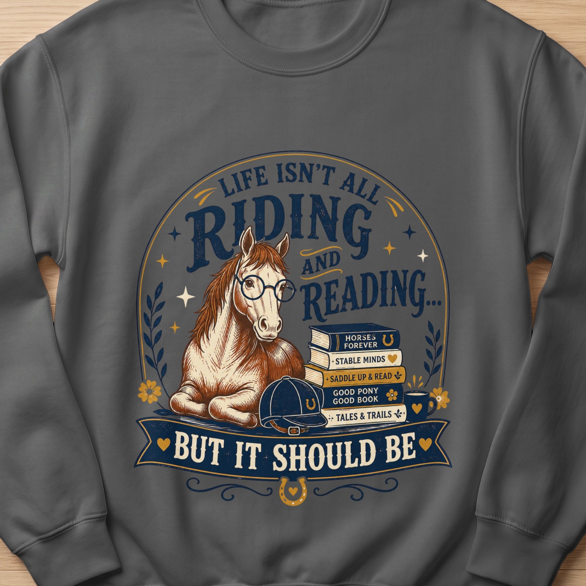 Horse wearing glasses with books and the text "Life Isn't All Riding And Reading... But It Should Be."