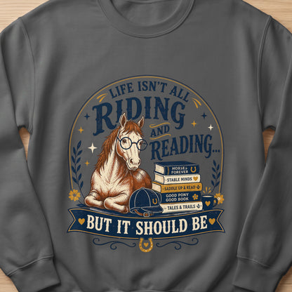 Horse wearing glasses with books and the text "Life Isn't All Riding And Reading... But It Should Be."