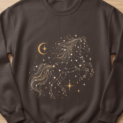Brown sweatshirt with a golden celestial horse constellation design and crescent moon.