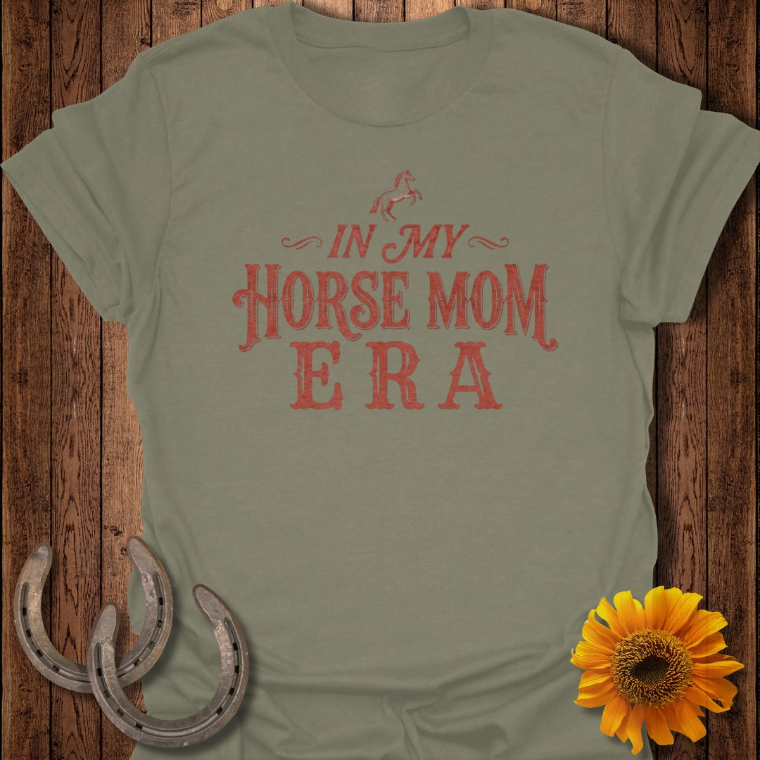 Olive t-shirt with red text "IN MY HORSE MOM ERA" and a horseshoe graphic.