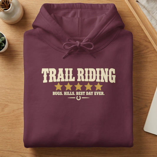 Maroon hoodie with "Trail Riding" text, stars, and horseshoe graphic.